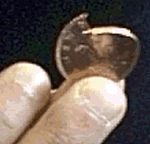 Pro torn two pence coin